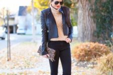 With dark gray jacket, black pants and leopard clutch