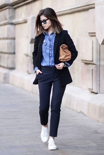 With denim shirt and white sneakers