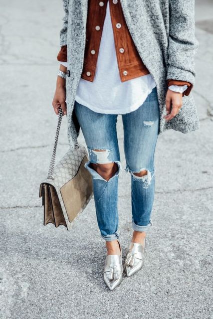 With distressed jeans, crossbody bag and coat