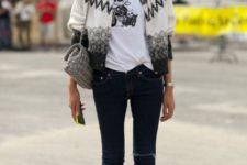 With funny t-shirt, printed jacket and jeans