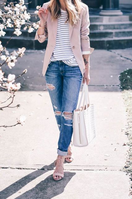 With gentle pink jacket and cuffed jeans