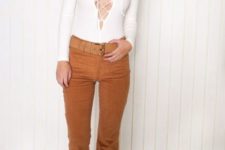 With lace up top and wide belt