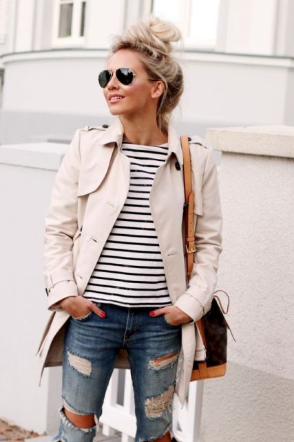 With neutral trench coat and jeans