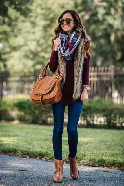 With plaid scarf, marsala shirt, fur vest and jeans