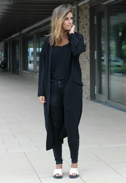 With pleated blouse and black jeans