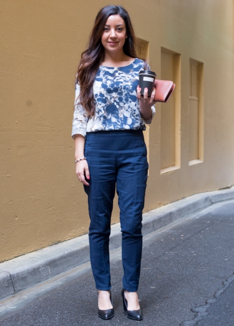 With printed blouse and black shoes