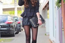 With shorts, hat, clutch and high heels