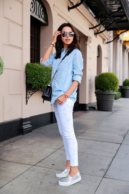 With skinny jeans and denim shirt