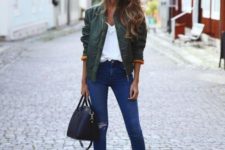 With white blouse, jeans and ankle boots