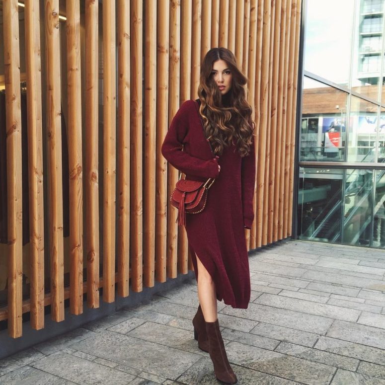 burgundy sweater dress, brown suede boots and a red bag