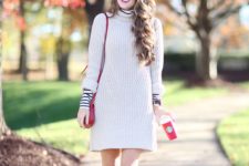 05 cream sweater dress, high boots and leg warmers