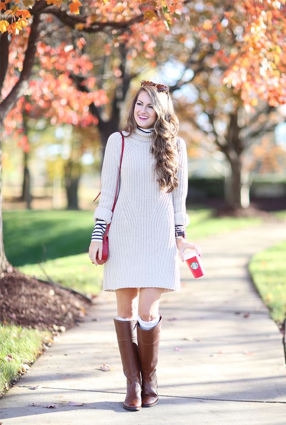 cream sweater dress, high boots and leg warmers