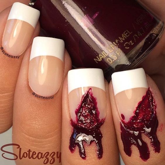 scary French manicure with blood dripping