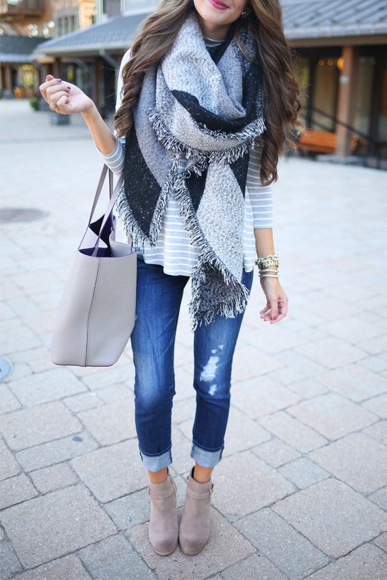 cuffed jeans, ankle boots and a grey striped sweater
