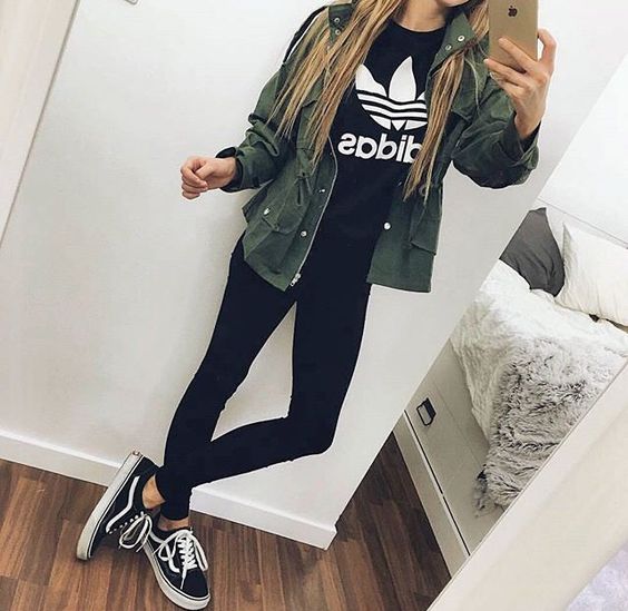 black leggings, an olive green jacket and black Vans (cool casual back to school outfit)