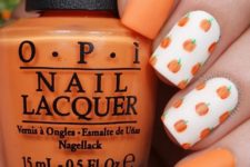 09 orange matte nails with pumpkin accents