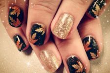 12 black nails with maple leaves and giltter accents
