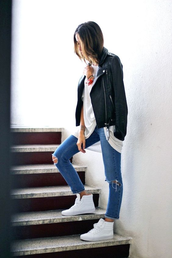 white hightop vans outfit with blue denim and a leather jacket