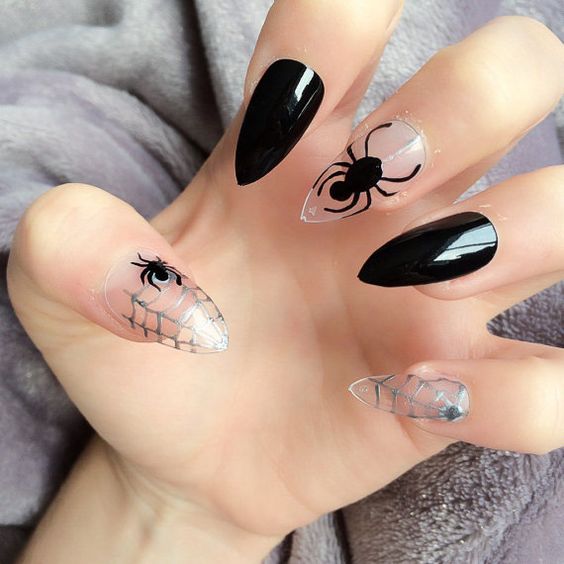 black and transparent nails with spiderwebs and spiders