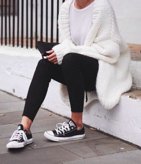chunky knit oversized white cardigan with black pants and Converse