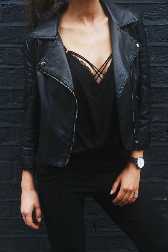 hot look with pants, a lace up top and a leather jacket