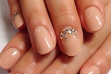 17 nude nails with rhinestone accent nails
