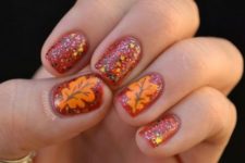 17 orange and glitter nails with leaves