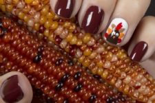 18 dark brown nails with a turkey accent