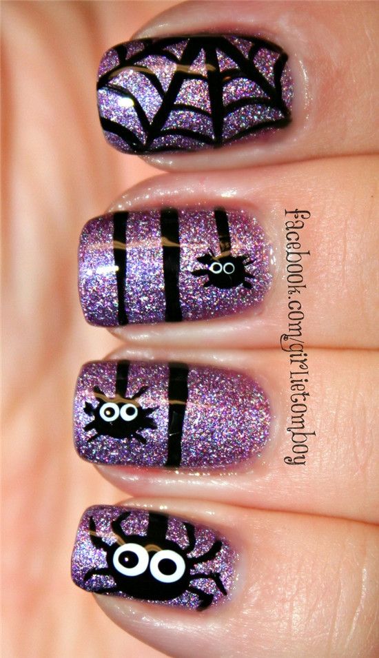 glitter purple nails with funny spider decals