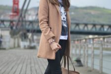 18 leather pants, a printed tee, a camel coat and leopard Vans