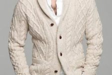18 warm knit ivory cardigan, a white shirt and tan trousers