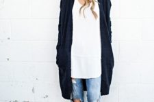 24 long navy cardigan, an oversized white shirt and ripped denim