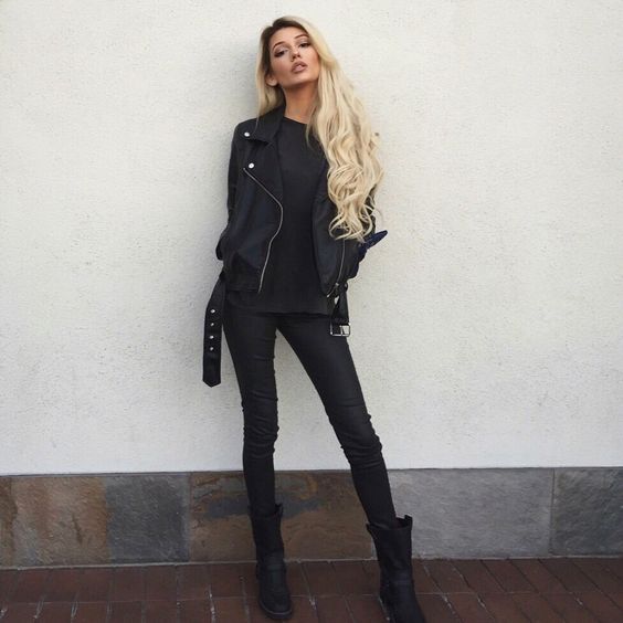 rock look with leather pants, a sweatshirt, high boots and a jacket