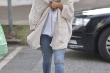 27 white chunky knit cardigan with jeans and heels