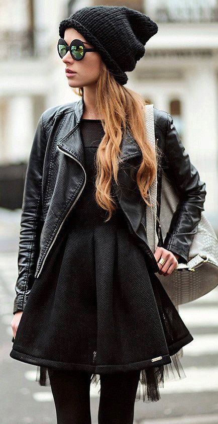 tights, a tweed dress, a leather jacket and a beanie