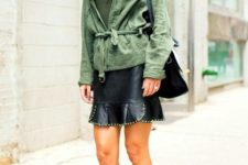 Green army belted jacket with leather mini skirt