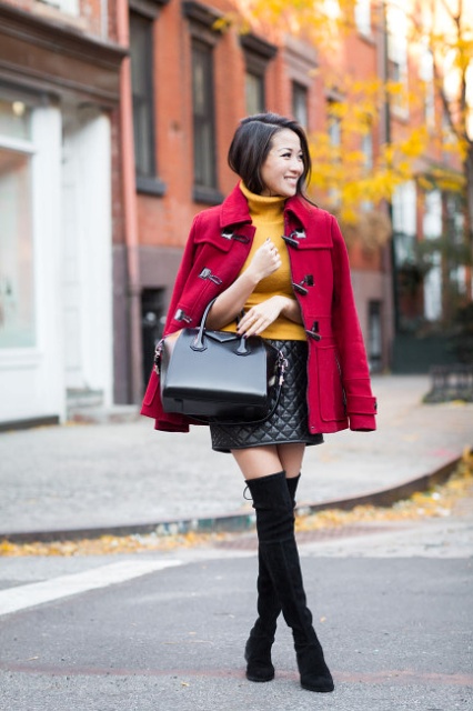 Red coat wih orange turtleneck, leather mini skirt and over the knee boots