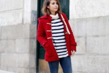 Red coat with striped sweater and jeans