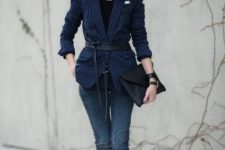 Striped navy blue jacket with distressed jeans and loafers