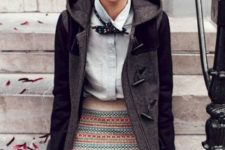 With button down shirt, bow tie and printed skirt