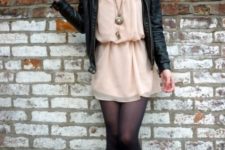 With chiffon dress, leather jacket and black tights