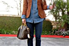 With denim shirt, suede jacket and cuffed jeans