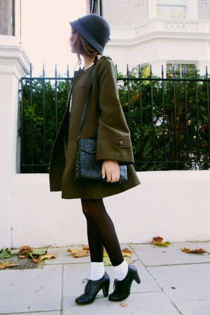 With dress, leather bag, black tights and ankle boot with white socks