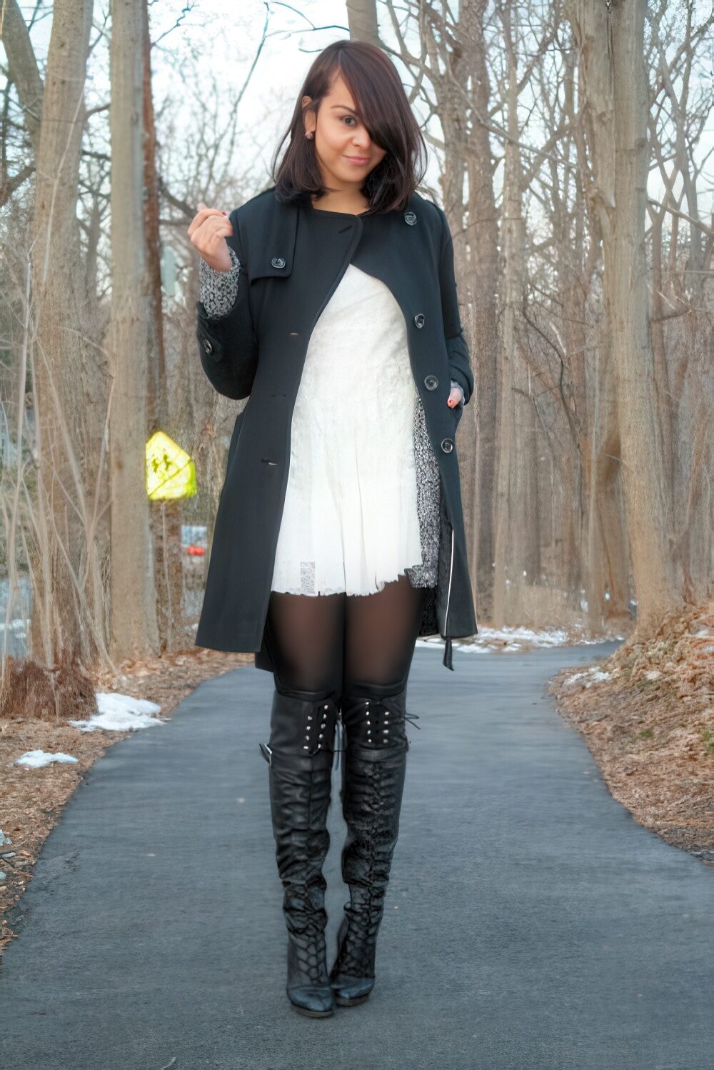 With lace dress and dark gray coat