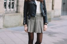 With leather jacket and ankle boots