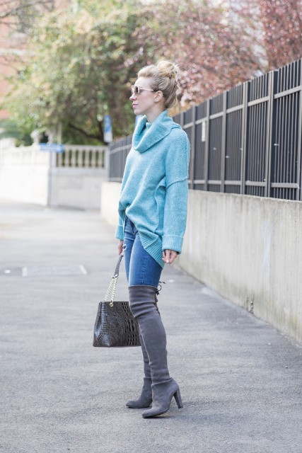 With loose bright color sweater and leather bag