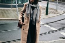 With oversized scarf, crop pants and white sneakers