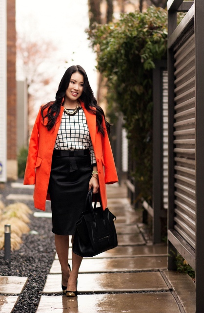 With printed blouse, black pencil skirt and two color shoes