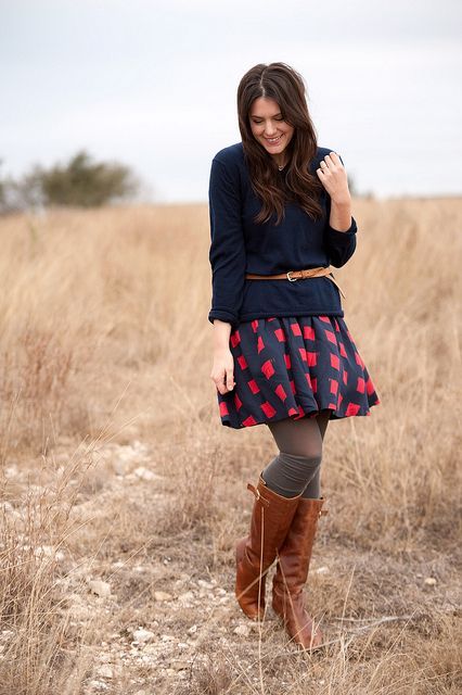 With printed skater skirt and high boots