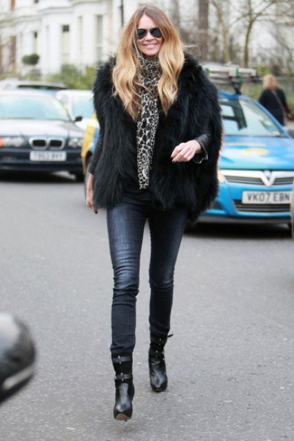 With skinny jeans, animal printed scarf and fur jacket